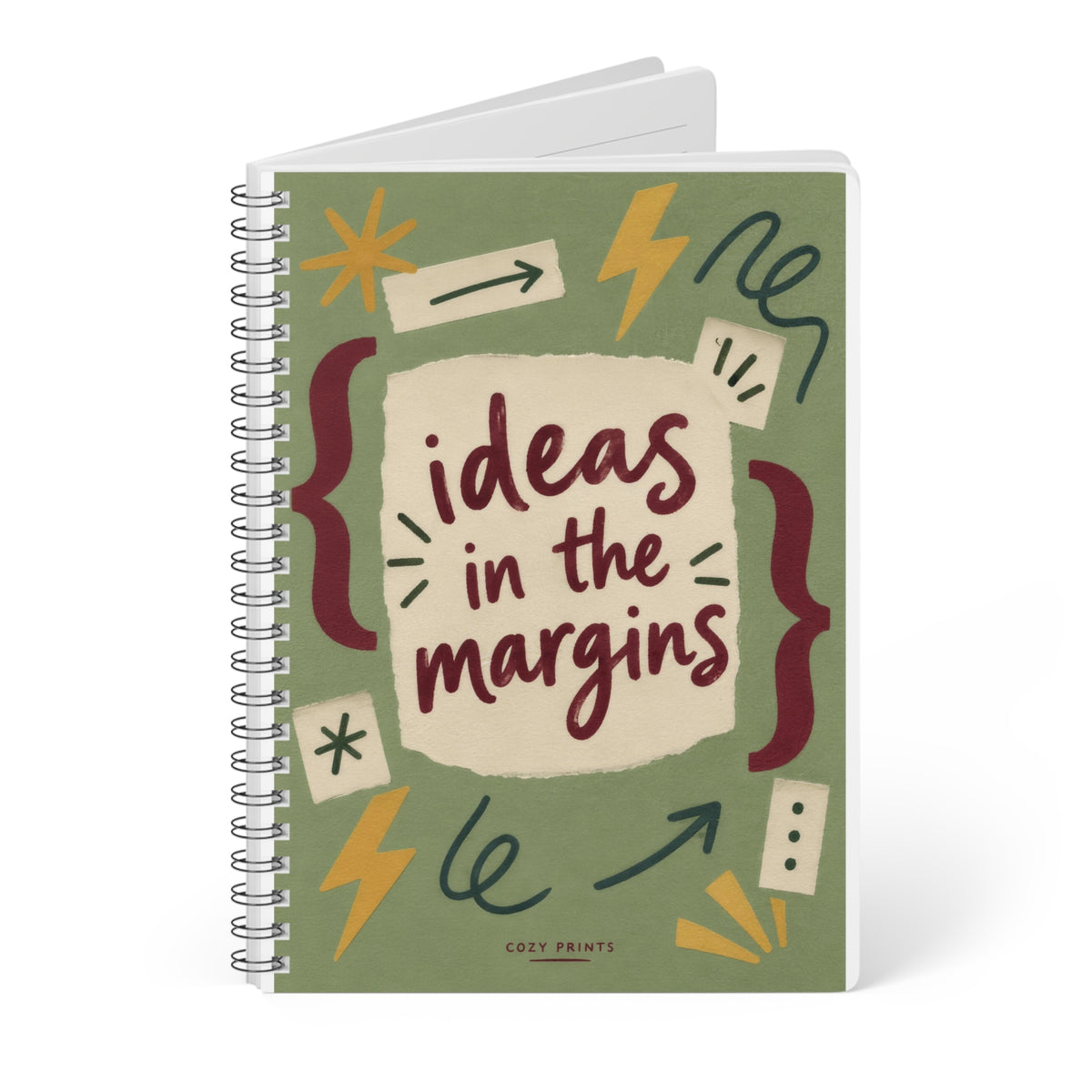 Angled view of Ideas in the Margins A5 notebook by Cozy Prints UK, showing the illustrated front cover and black wire binding.