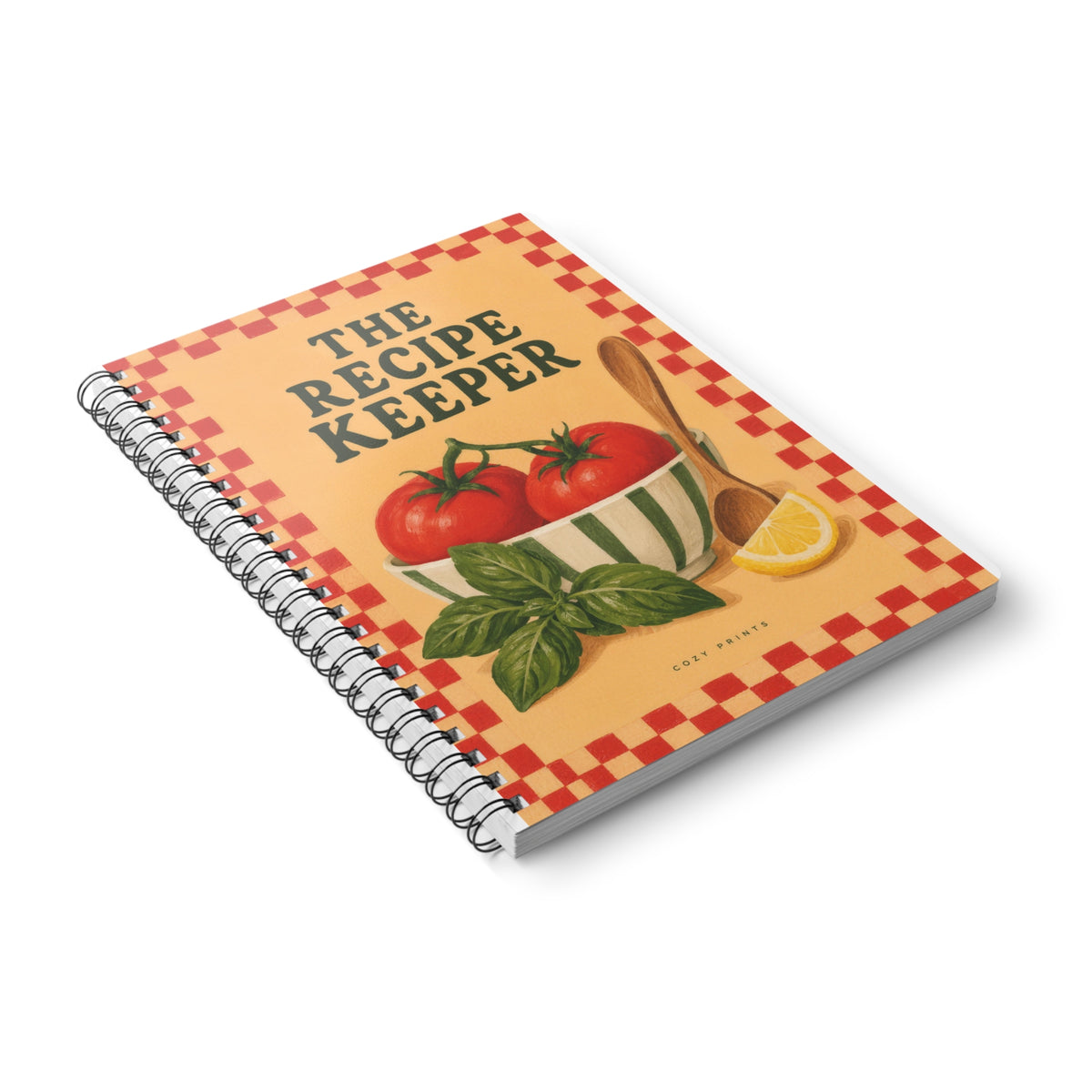 The Recipe Keeper A5 notebook by Cozy Prints UK, showing the illustrated front cover and black wire binding.