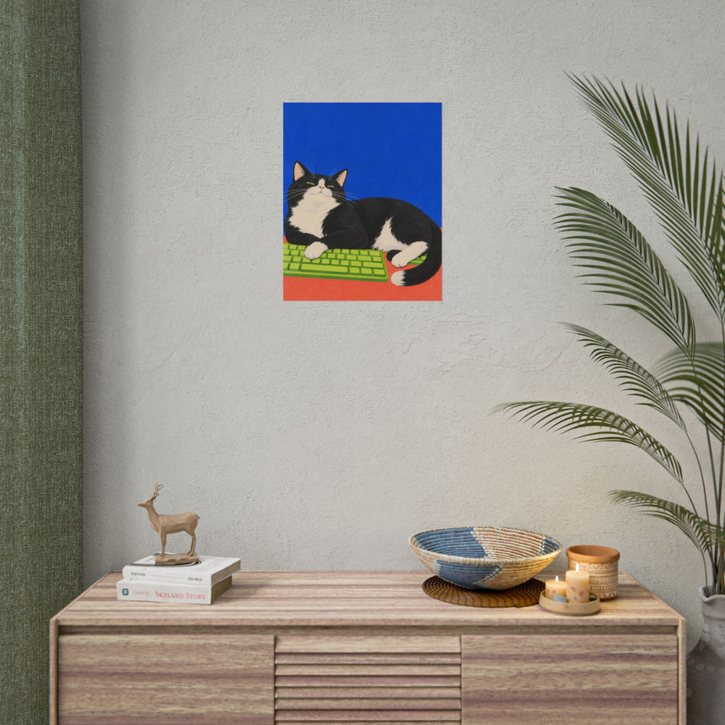 Desk Supervisor art print by Cozy Prints UK: black-and-white cat resting on a lime keyboard against cobalt blue.