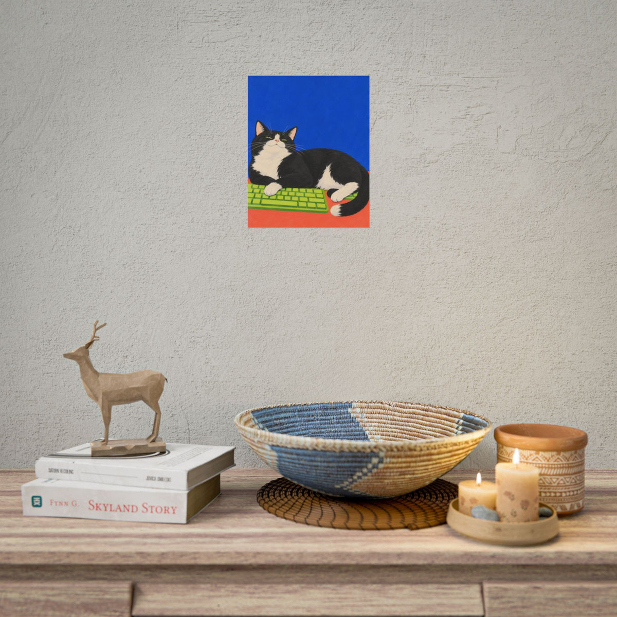 Desk Supervisor art print by Cozy Prints UK: black-and-white cat resting on a lime keyboard against cobalt blue.