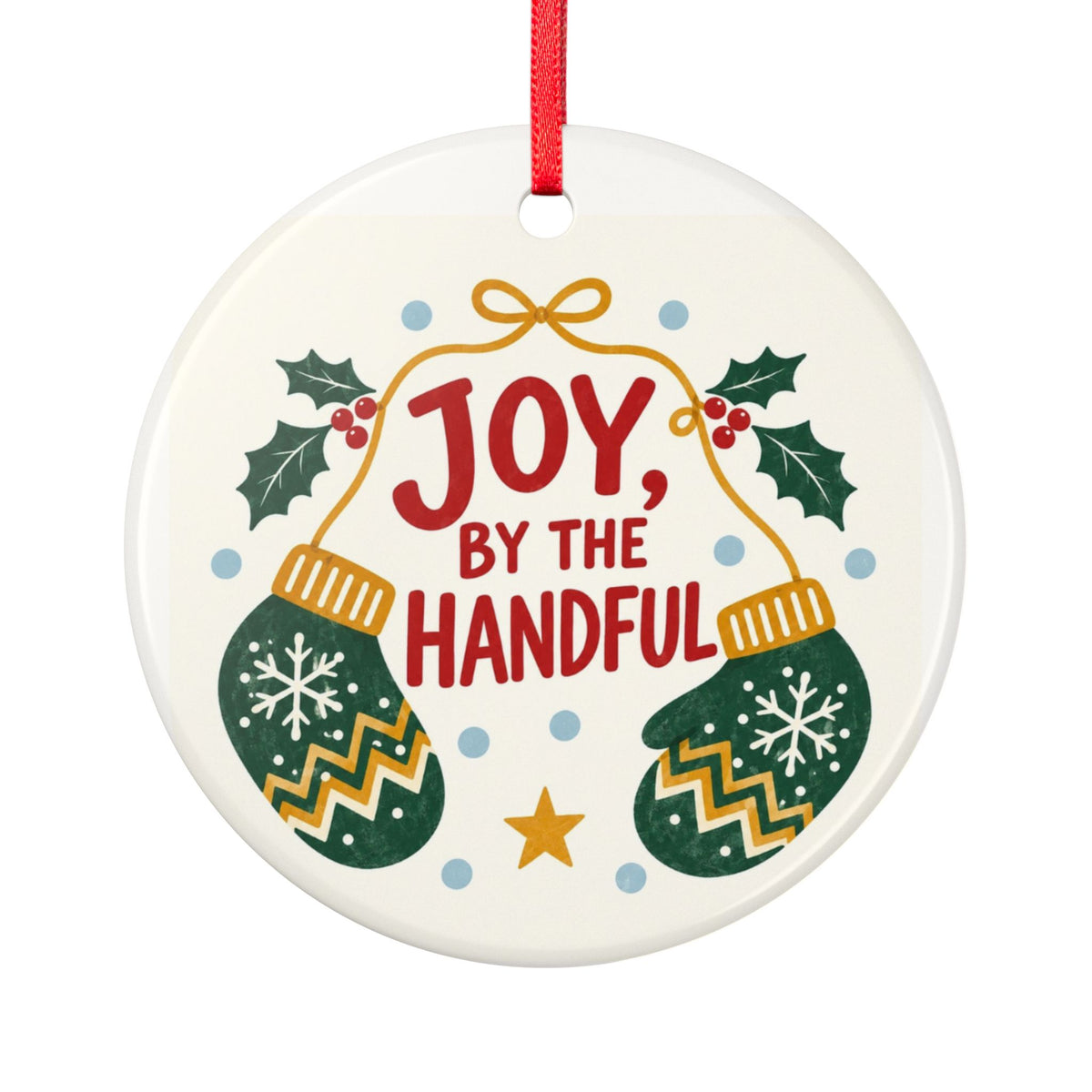 Round ceramic hanging ornament showing green patterned mittens with red Joy by the Handful lettering and holly.