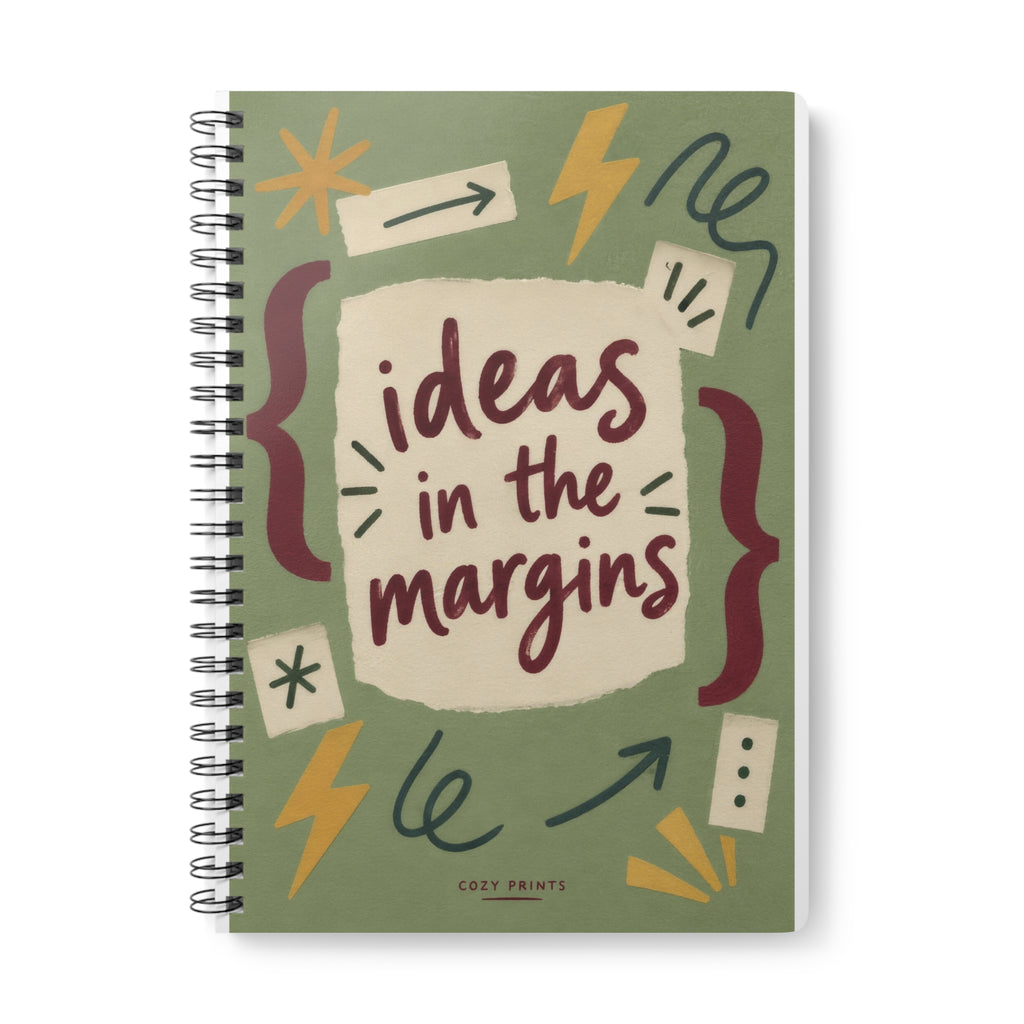 Ideas in the Margins A5 notebook by Cozy Prints UK: sage collage cover with editing marks and “ideas in the margins” lettering.