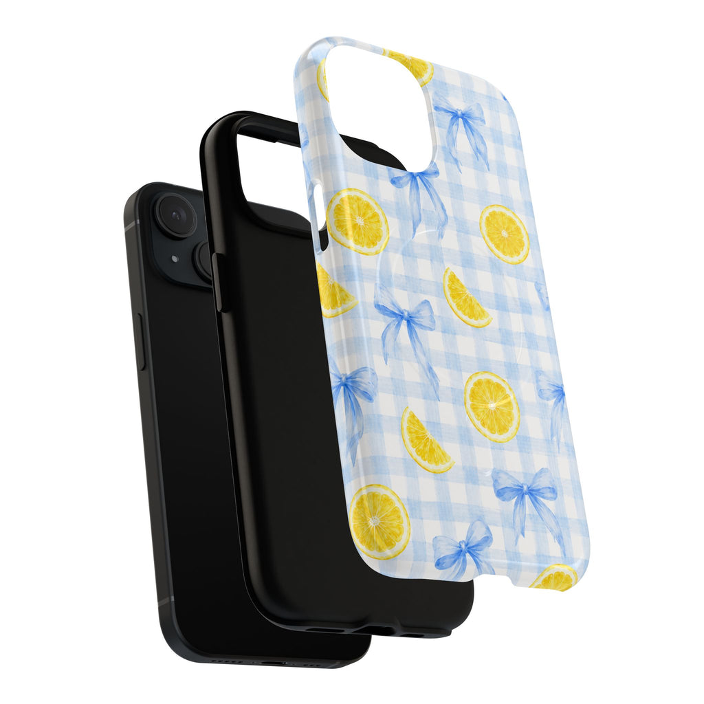Exploded view of the Lemon and Blue Bows case showing the patterned outer shell, black inner layer and phone.