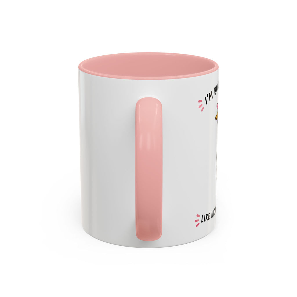 Side view of the pink Built Different duck mug showing the handle