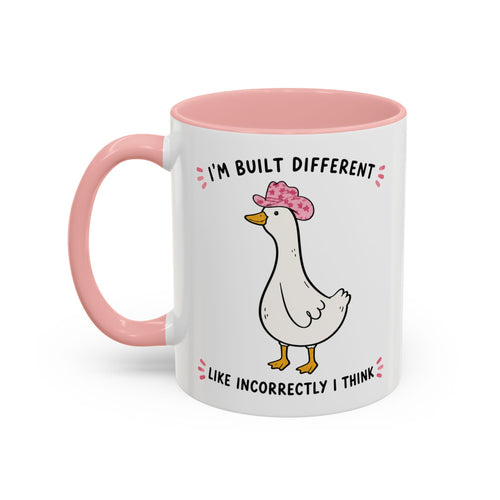 Front view of the pink Built Different duck accent mug