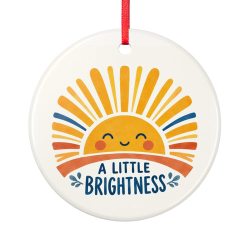 Round ceramic hanging ornament showing smiling golden sun and blue A Little Brightness lettering.
