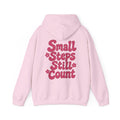 Back of light pink hoodie with burgundy Small Steps Still Count floral print