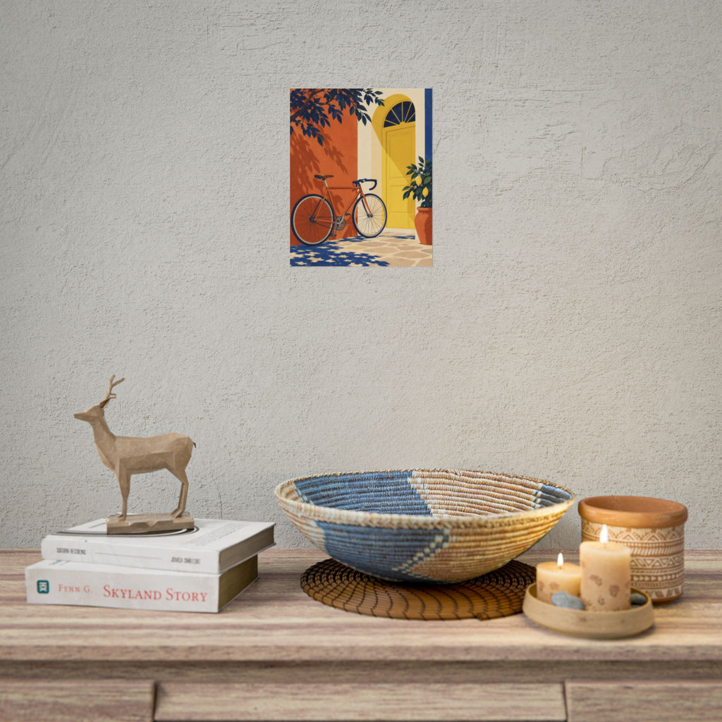 Pedal & Pause art print by Cozy Prints UK: bicycle beside a yellow doorway, terracotta wall and leafy plants.