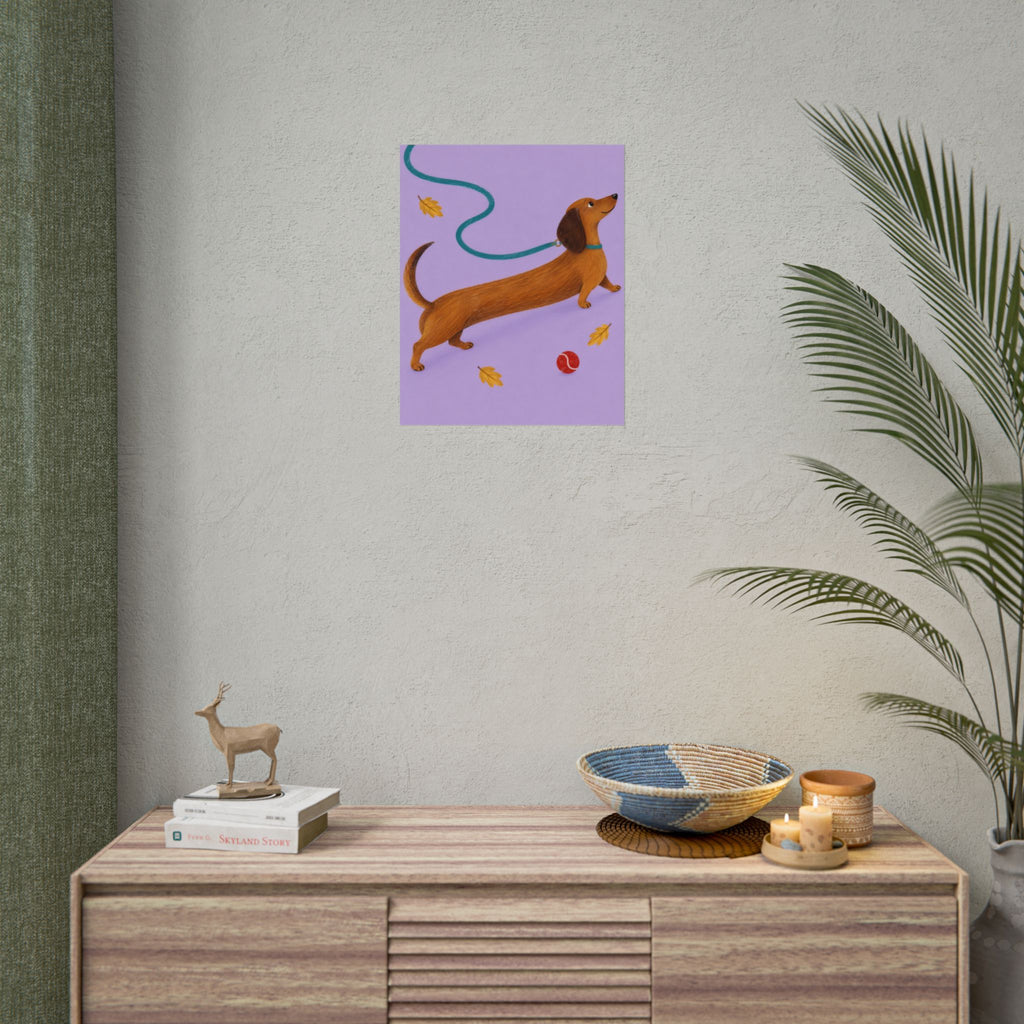 Long Dog, Big Day art print by Cozy Prints UK: caramel dachshund on lilac with a teal lead, yellow leaves and a red ball.