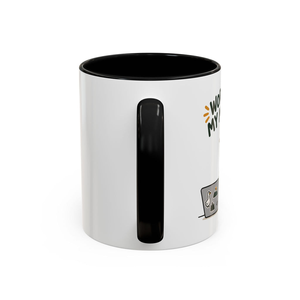 Handle view of the black Works on My Machine goose mug