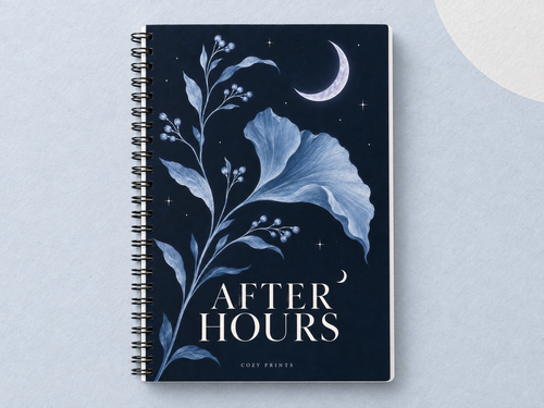 After Hours A5 wirebound notebook with a navy botanical cover and crescent moon on a pale silver-blue backdrop.
