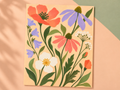 Pocket Meadow unframed wildflower print in coral, lilac and green on a peach and sage backdrop.