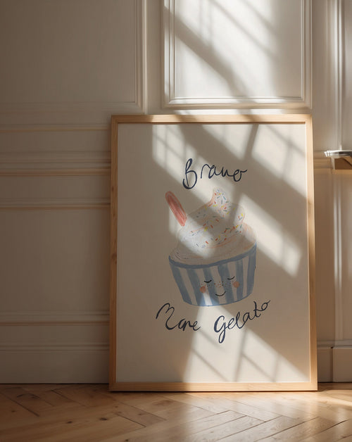 Bravo More Gelato print with a smiling blue-striped ice cream tub, displayed in a wooden frame in window light.